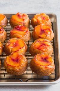 peach mini cakes in the baking pan